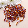 Amber beads for children baroque cognac color with amethyst