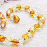 Amber beads for children polished lemon and honey color