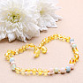 Amber beads for children polished in lemon color with morganite