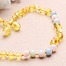 Amber beads for children polished in lemon color with morganite