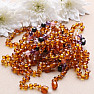 Amber beads for children polished in the color of cognac with a mix of semi-precious stones