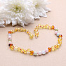 Amber beads for children polished in the color of lemon and cognac with morganite