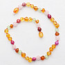 Amber beads for children with rose quartz, agate and ulexite