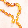 Amber beads for children polished beans in honey color