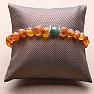 Cognac amber bracelet with a jadeite bead