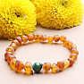 Cognac amber bracelet with a jadeite bead