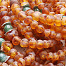 Cognac amber bracelet with a jadeite bead