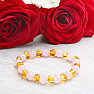 Amber bracelet in the color of honey with rose gold