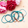 A set of five unisex fashion bracelets in a turquoise tone