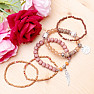 A set of five unisex fashion bracelets in a brown tone