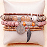 A set of five unisex fashion bracelets in a brown tone