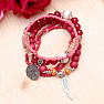 A set of five unisex fashion bracelets in a red tone