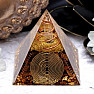 Orgonite pyramid with tiger eye, crystal and spiral