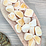 Calcite orange pebble with burr