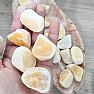 Calcite orange pebble with burr