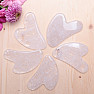 Gua sha made of crystal heart shape