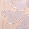 Gua sha made of crystal heart shape