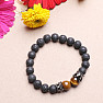 Lava stone bracelet with tiger&#39;s eye and crowns