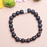 Lava stone with Om symbol beaded bracelet