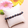 Lava stone with Om symbol beaded bracelet