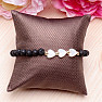 Lava stone bracelet with mother of pearl hearts