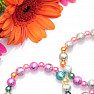 Children&#39;s bracelet made of colorful acrylic beads with glittering beads