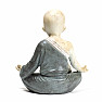 Buddhist monk statuette of a boy in gray robes colored