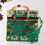 Green brocade bag with zipper and lucky coin 12x12 cm