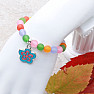 Children's bracelet with colored beads and a flower