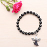 Children&#39;s bracelet made of black glass beads with an angel