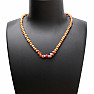 Necklace made of wooden beads with carnelian