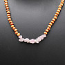 Necklace made of wooden beads with rose quartz