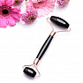 Obsidian black massage roller in pink gold color