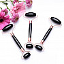 Obsidian black massage roller in pink gold color