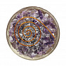 Orgonite hemisphere paperweight with amethyst