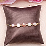 Pearl bracelet with colored pearls and cubic zirconia drawstring