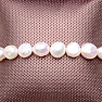 Women's pearl bracelet made of white pearls with Shamballa clasp