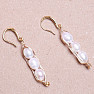 Fashionable earrings with pearls