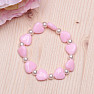 Children&#39;s bracelet made of light pink hearts with pearls