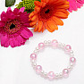 Children&#39;s bracelet made of pink acrylic beads with pearls