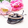 Set of four fashionable leather and wood unisex bracelets