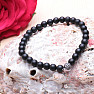 A set of three fashionable men&#39;s bracelets made of agate and hematite