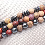 Set of three bracelets made of wooden beads and hematite beads