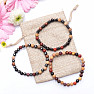 Set of three bracelets made of wooden beads and hematite beads