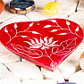 Heart rack on red incense sticks