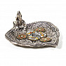 Metal stand in the shape of a leaf with Ganesha for fragrant cones