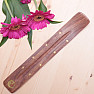 Wood incense stick stand with yin and yang symbol