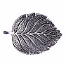 Incense holder silvery in the shape of a wide leaf