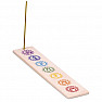 Chakra stand with chakra symbols on incense sticks