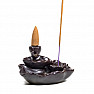 Stand for incense cones with flowing Lotus smoke